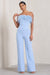 First Class | Combinaison bleue a jambes evasees et haut bandeau a plumes
