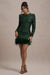 Claudia | Mini-robe verte à paillettes et col haut avec ourlet en plumes et manches longues