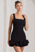 Lucy | Mini-robe noir à bretelles et longueur en cascade