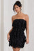It Girl | Mini robe moulante noire à bandeau et fronces