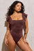 Riviera | Maillot de bain couleur bronze à dos nu et bretelles à volants