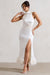 Zoe | Robe longue torsadée en satin crème et bordure de plumes