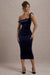 Carella | Robe mi-longue asymétrique torsadée en velours bleu marine