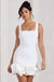 Lucy | Mini-robe blanche à bretelles et bordure froncée