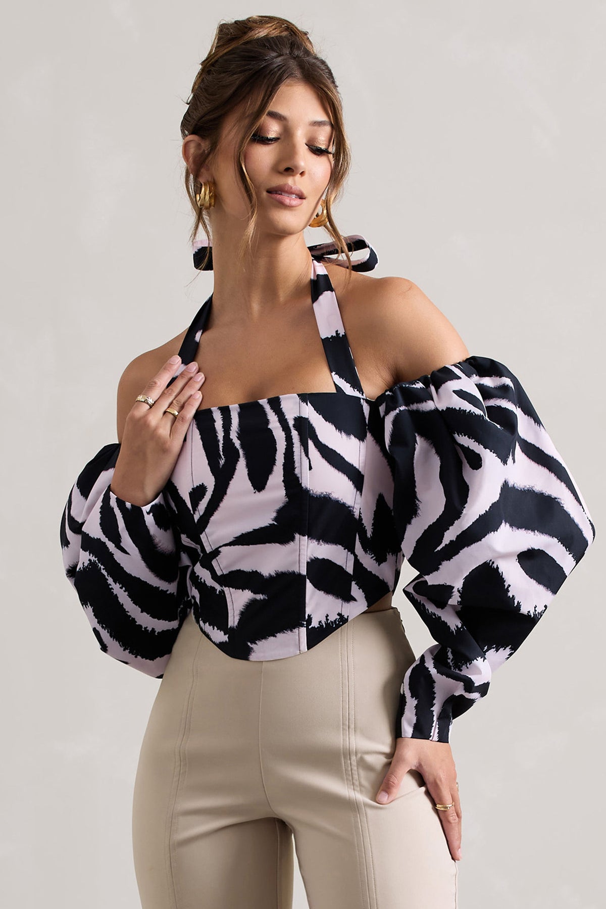 WB_HR_CL132248018-TheatricZebraPrintHalter-NeckCorsetTopWithPuff-Sleeves_HR_CL132253059-OnStageChampagneCroppedCapriPantsWithKnotDetail0copy_ffafcaca-0340-4817-b468-c6e6c078cef2