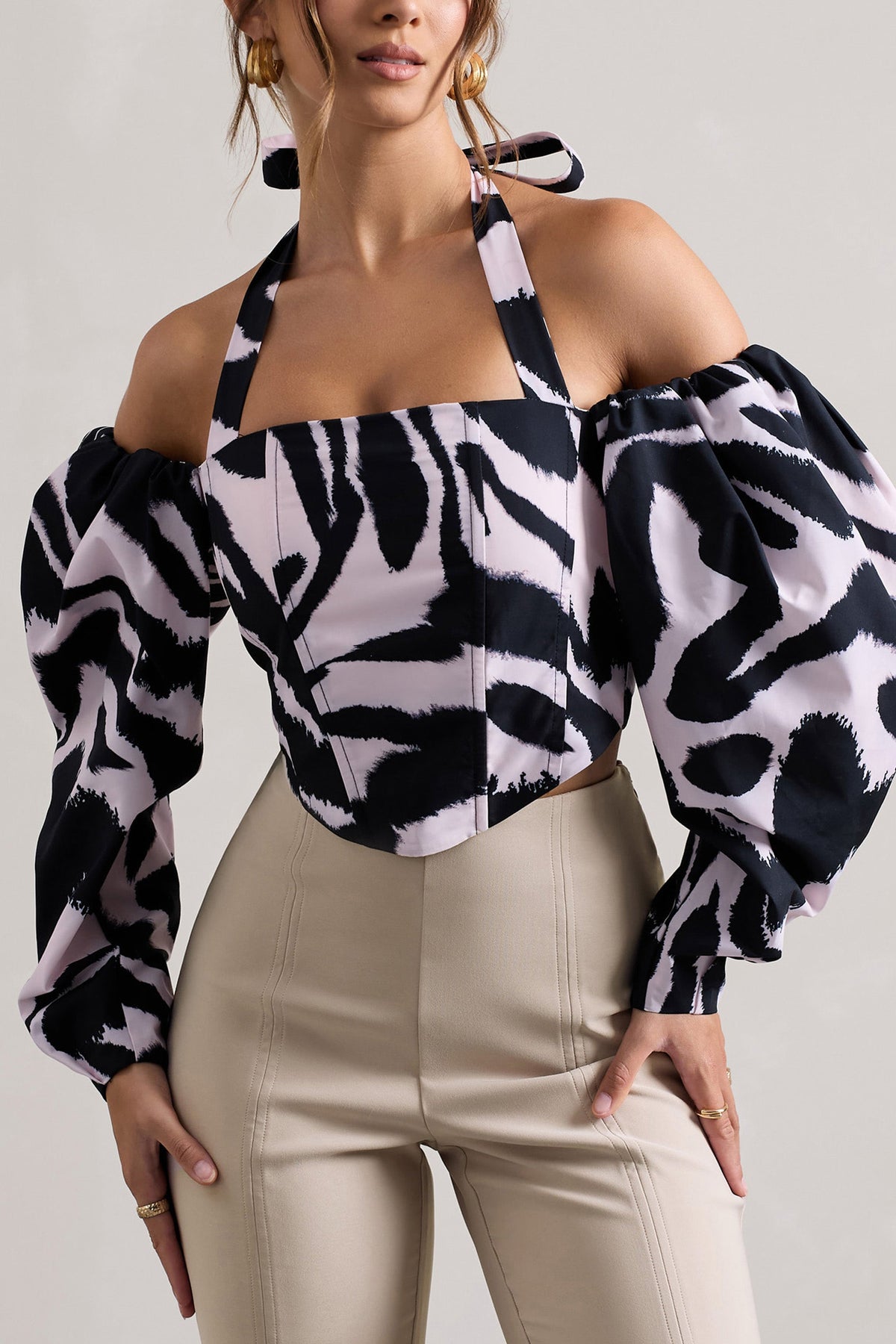 WB_HR_CL132248018-TheatricZebraPrintHalter-NeckCorsetTopWithPuff-Sleeves_HR_CL132253059-OnStageChampagneCroppedCapriPantsWithKnotDetail10_fa252680-71c8-48b1-a7e7-59f7f06e36bf