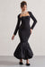 London | Robe longue noire encolure en coeur et longueur volumineuse