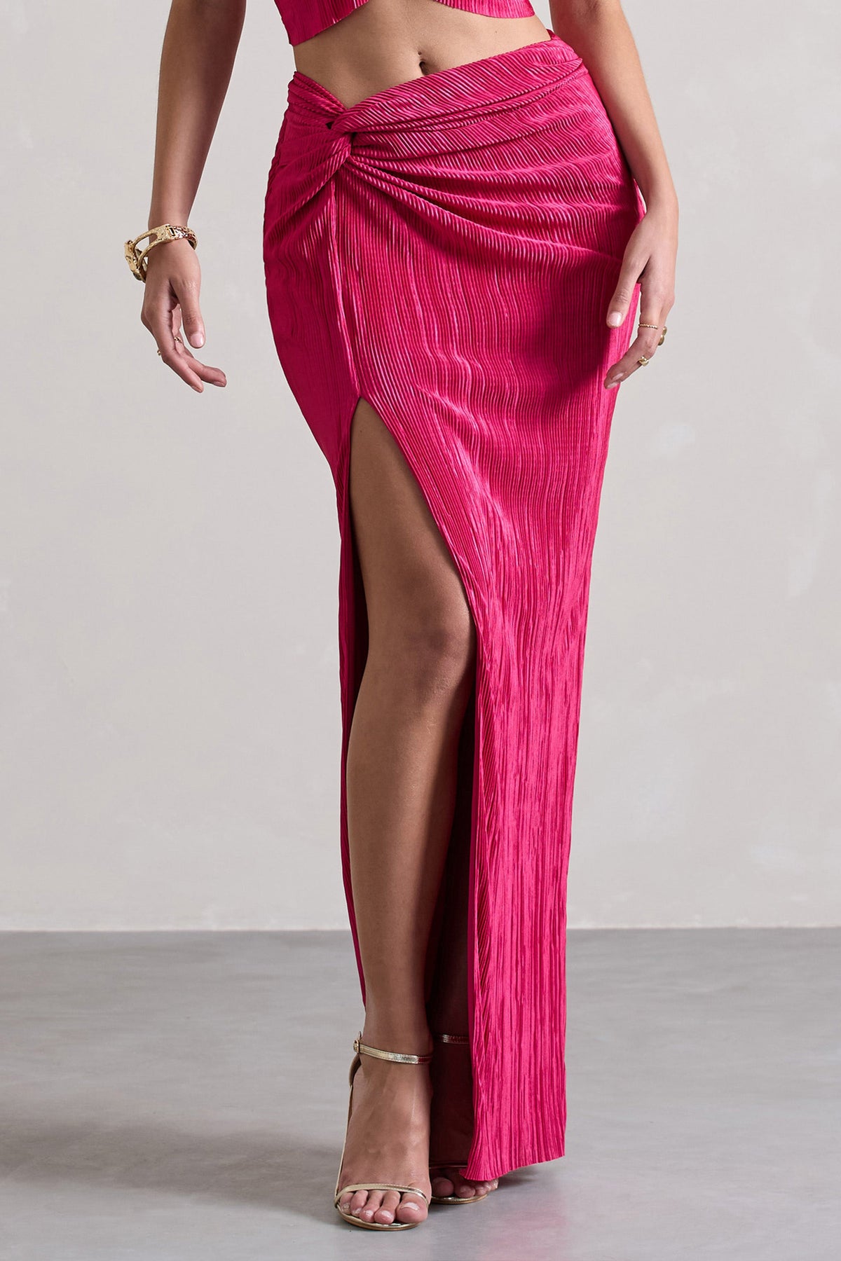 Calida | Jupe longue plissée à fente et nœud rose fuchsia