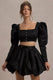 Eloisa | Veste courte en satin noir à manches bouffantes