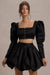 Eloisa | Veste courte en satin noir à manches bouffantes
