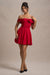 Minimoiselle | Mini-robe bardot rouge avec nœud et jupe bouffante