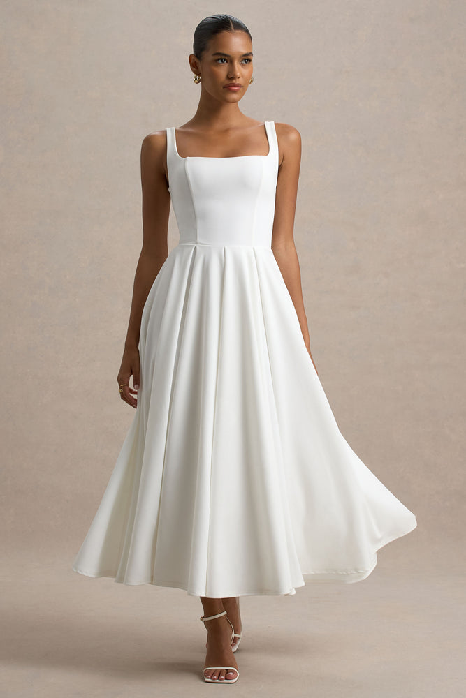 Parina – Robe mi-longue blanche à bretelles et ourlet volumineux Robes de mariée courtes The Wedding Explorer Parina – Robe mi-longue blanche à bretelles et ourlet volumineux Robes de mariée courtes The Wedding Explorer