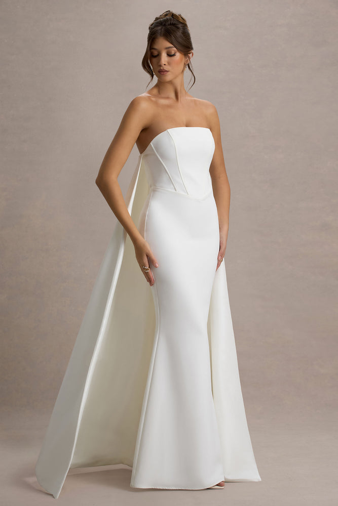 She’s Trouble – Robe Longue Blanche Bandeau avec Cape Rose Robes de mariée The Wedding Explorer She’s Trouble – Robe Longue Blanche Bandeau avec Cape Rose Robes de mariée The Wedding Explorer